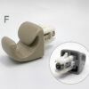 Close-up of a beige plastic medical device part with a gray connector; inset circles show the inner housing. TOYOTA Genuine Sun Visor Clip / Holder #E » JDM-PARTS NZ