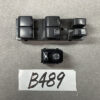 Automotive power window and mirror control switch module with four window buttons and a rotary mirror-adjustment knob, shown with a B489 label beneath. NISSAN ELGRAND E52 Genuine Right Rear Power Window Switch 25411 JD05A » JDM-PARTS NZ