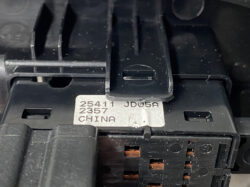 Close-up of a black electrical component with a white label reading '25411 JD05A 2357 CHINA'.