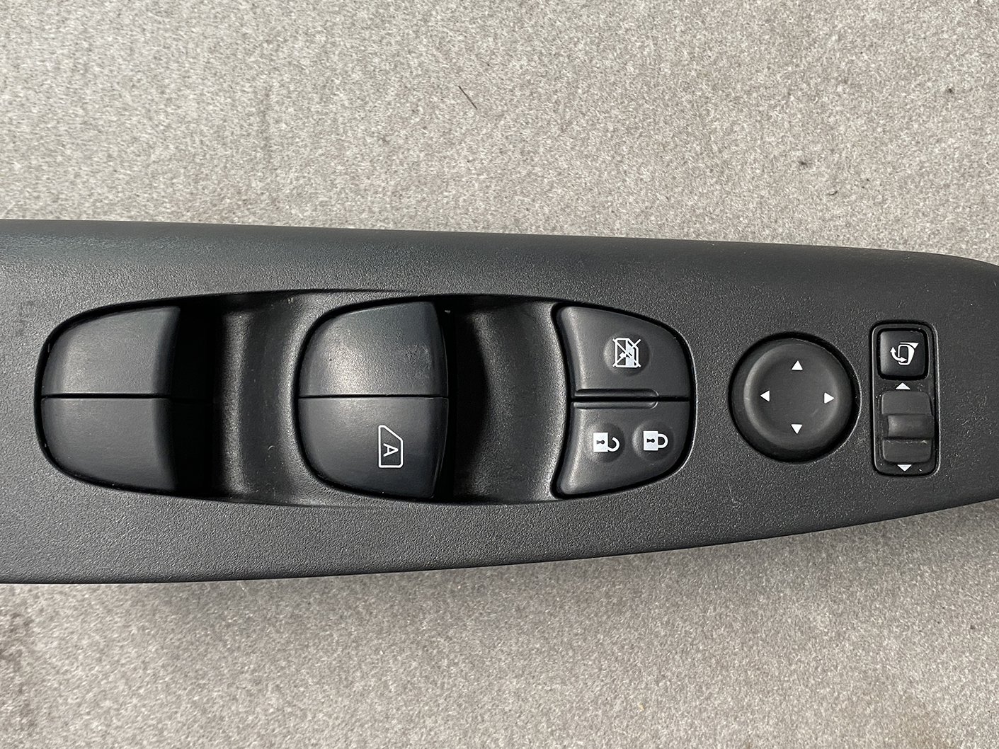 B493_3 NISSAN SERENA SUZUKI LANDY C27 Master Power Window Switch 25401 5TT0A » NZ1.95 » JDM-PARTS NZ » JDM-PARTS NZ Car door control panel with power window switches, window lock, mirror adjust dial, and lock buttons on a black interior surface NISSAN SERENA SUZUKI LANDY C27 Master Power Window Switch 25401 5TT0A » JDM-PARTS NZ