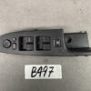 Driver-side car door control panel featuring window switches, lock button, and a circular mirror-adjustment pad on a black plastic panel. TOYOTA PRIUS ZVW50 Genuine Master Power Window Switch 74231-47220 » JDM-PARTS NZ