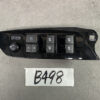 Black car door switch panel with window controls, mirrors, and lock buttons laid on a gray surface. TOYOTA NOAH VOXY AZR60 Master Power Window Switch 84040-28060 » JDM-PARTS NZ