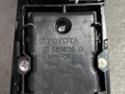 Close-up of a Toyota car part with the stamped code R 515676 B and material PP-GF20 (plastic housing).