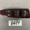 Woodgrain car window control panel with six black switches and an 'ALL AUTO' label on the door trim. TOYOTA VITZ SCP90 Genuine Master Power Window Switch 74231-52290 » JDM-PARTS NZ