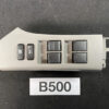 Car interior: power window switch panel with four window controls and a window lock switch, light gray plastic. TOYOTA VITZ SCP90 Genuine Master Power Window Switch 192830 » JDM-PARTS NZ