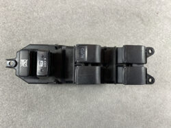 Black automotive window control panel with four switch buttons and a Lock button, including an Auto label on the center switch