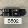 Car power window switch assembly with two window buttons and a window lock button, labeled B502 on a dark base. TOYOTA PRIUS ZVW55 Genuine Master Power Window Switch  84040-47080 » JDM-PARTS NZ