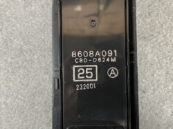 Close-up of a black component with printed codes: 8608A091, C8D-D624M, a 25 inside a square, a circled A mark, and the code 2320D1.