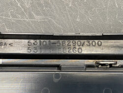 Stamped part numbers on a metal badge: 53101-58290/300 and 53111-58260, likely vehicle component ID badges/plates.