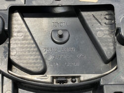 Under-hood plastic mounting panel from a Toyota, showing part numbers 75312-58180 and 75301-58260 with an NS mark and embossed TOYOTA.