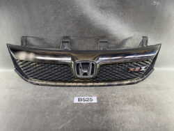 Front view of a black Honda car grille with a chrome emblem in the center and an RSZ badge on the right side.