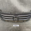 Front grille assembly for a Honda vehicle with the silver Honda emblem in the center; black horizontal slats and mounting brackets visible. HONDA INSIGHT ZE2 Genuine Radiator Grille 71121-TM8 » JDM-PARTS NZ