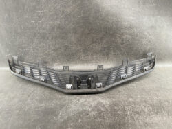 Front bumper grille insert with mounting clips for a car's front end