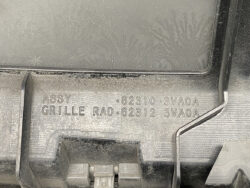 Plastic auto grille/radiator housing with stamped numbers 62310 3VA0A and 62312 3VA0A.
