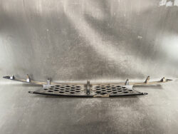Plastic front bumper grille with honeycomb mesh and mounting clips