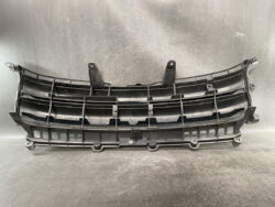 Black plastic front car grille assembly with mounting tabs and horizontal slats