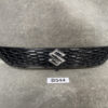 Black honeycomb front grille with a Suzuki emblem centered on a vehicle surface. SUZUKI SOLIO MA36S MA46S Genuine Radiator Grille  72110-81P5 » JDM-PARTS NZ