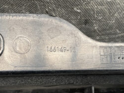 Close-up of a gray metal surface with the stamped serial number '166149-10' and a small grid labeled A–E on the right side.