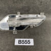 Clear car taillight assembly with LED strip and mounting tabs on a dark surface. TOYOTA ALPHARD VELLFIRE H20 Genuine Tailgate lens KOITO 58-38 Left Side x1 » JDM-PARTS NZ