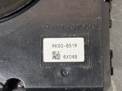 Plastic electrical component with label: model RK00-651R and QR code (6X04B).