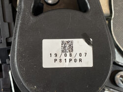Suzuki Solio Mitsubishi Delica D:2 Genuine Power Slide Door Motor P81P0R Right Side 11 Close-up of a black mechanical part with a white label featuring a QR code, the date 19/08/07, and the code P81POR.