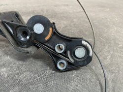 Suzuki Solio Mitsubishi Delica D:2 Genuine Power Slide Door Motor P81P0R Right Side 13 Close-up of a bicycle rear derailleur mechanism with pulleys, plastic frame, and a gear cable visible, showing wear and dirt.
