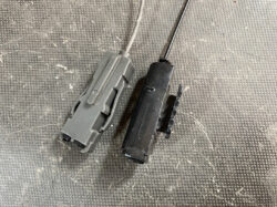 Suzuki Solio Mitsubishi Delica D:2 Genuine Power Slide Door Motor P81P0R Right Side 12 Two automotive electrical connectors in gray and black with locking latches and attached wires on a textured surface.