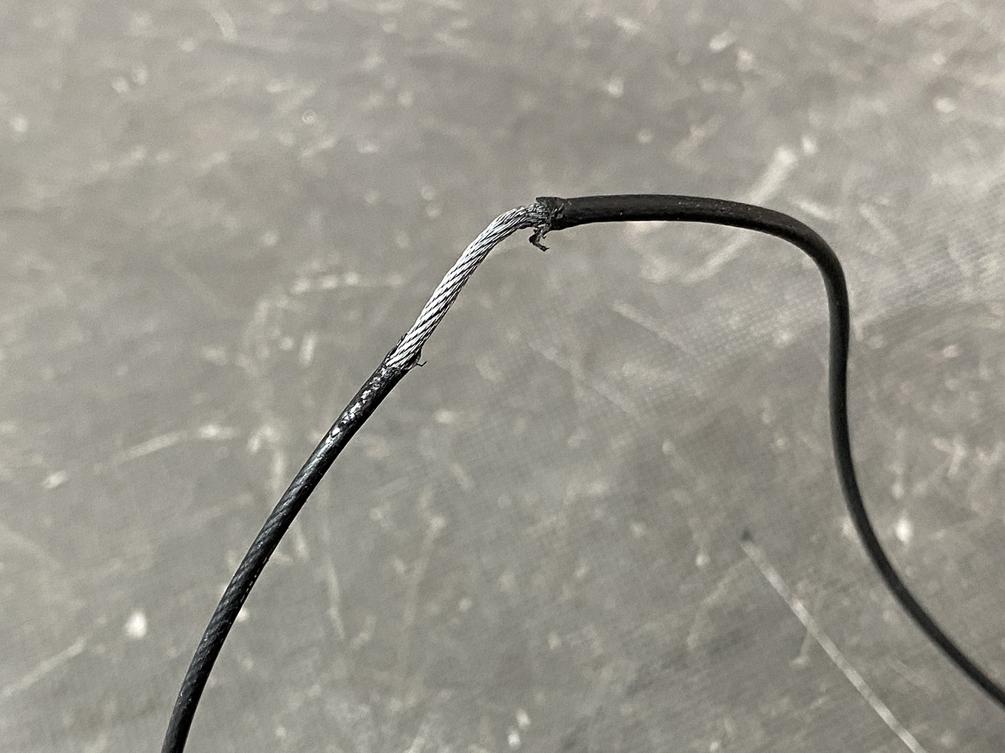 Suzuki Solio Mitsubishi Delica D:2 Genuine Power Slide Door Motor 79R0L Left Side 11 Close-up of a damaged electrical cable with exposed silver strands and frayed insulation.